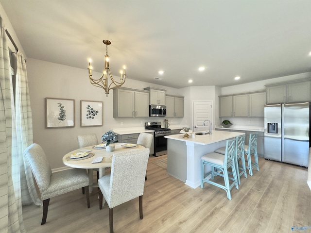 211 Shangrila Way, Meridianville, AL 35759 - dining room featuring recessed lighting, a chandelier, light wood finished floors, and baseboards