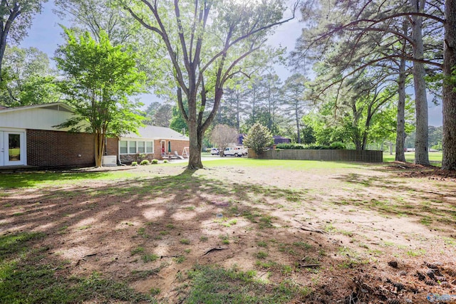 view of yard featuring fence