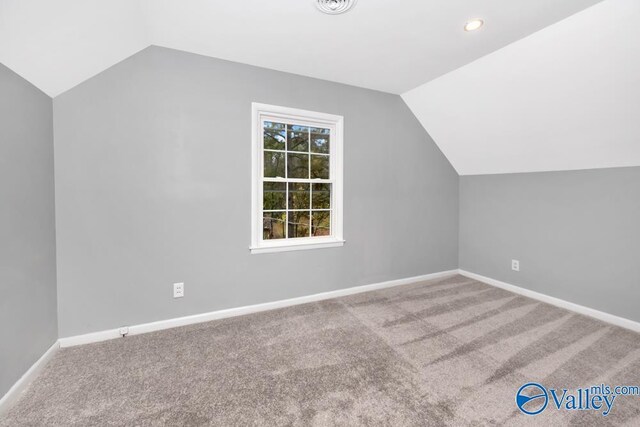 2512 Vista Dr SE, Huntsville, AL 35803 - additional living space featuring lofted ceiling, carpet floors, baseboards, and recessed lighting