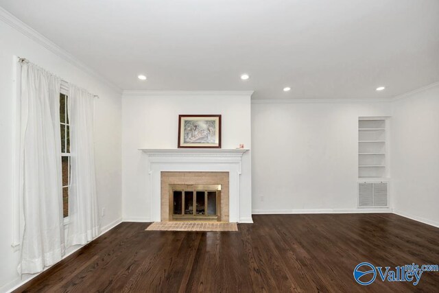 2512 Vista Dr SE, Huntsville, AL 35803 - unfurnished living room featuring recessed lighting, wood finished floors, ornamental molding, baseboards, and a fireplace