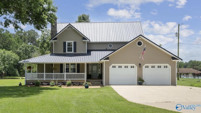 919 Colquitt Rd, Gadsden, AL 35903 - country-style home featuring covered porch, driveway, a garage, a front yard, and a metal roof