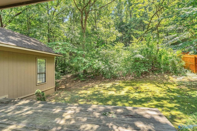 view of yard with a wooden deck