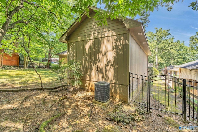 view of side of home featuring central AC unit