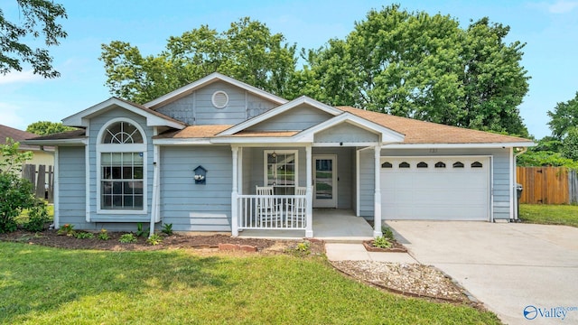 121 Oakline Dr, Madison, AL 35757 - ranch-style house featuring covered porch, a garage, driveway, and roof with shingles