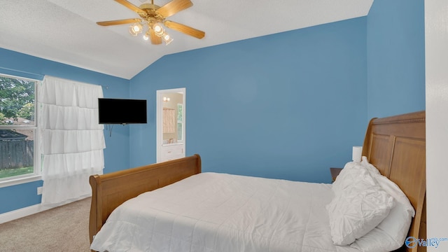 121 Oakline Dr, Madison, AL 35757 - bedroom with lofted ceiling, carpet, baseboards, a ceiling fan, and ensuite bath