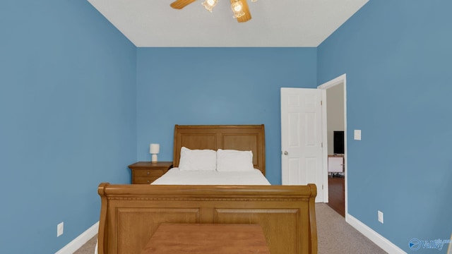 121 Oakline Dr, Madison, AL 35757 - bedroom featuring light colored carpet, baseboards, and ceiling fan
