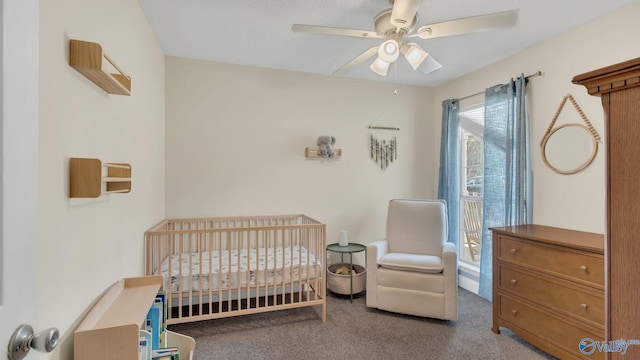 121 Oakline Dr, Madison, AL 35757 - carpeted bedroom with a nursery area and a ceiling fan