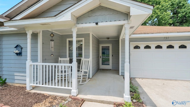121 Oakline Dr, Madison, AL 35757 - property entrance with a porch and a garage