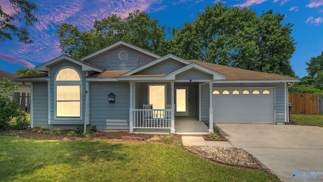 121 Oakline Dr, Madison, AL 35757 - ranch-style house featuring covered porch, an attached garage, concrete driveway, and roof with shingles