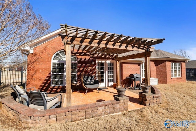 back of house featuring a pergola and a patio