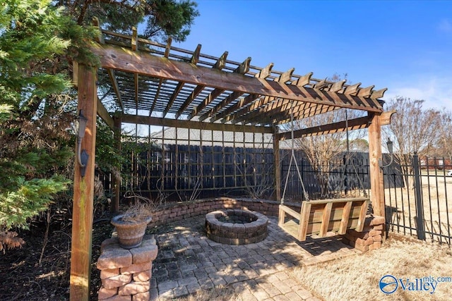 view of patio / terrace with a pergola and an outdoor fire pit