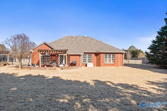 rear view of house featuring a patio area and a pergola