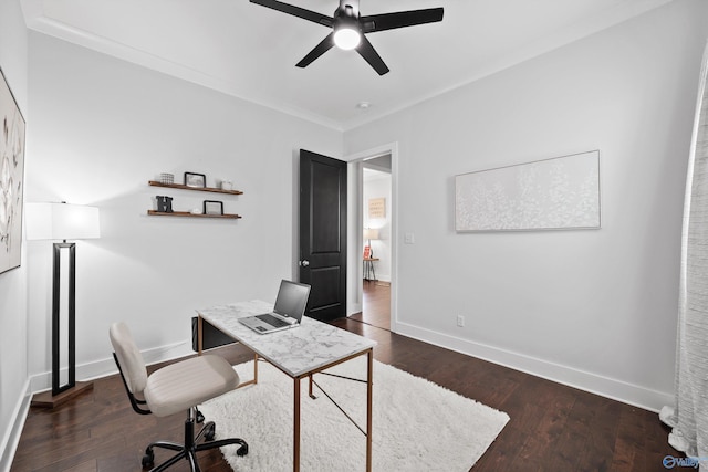 office space featuring ornamental molding, dark hardwood / wood-style floors, and ceiling fan