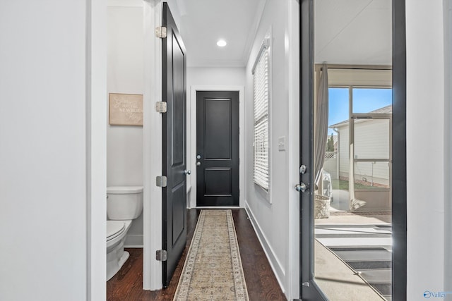 hallway featuring dark hardwood / wood-style flooring