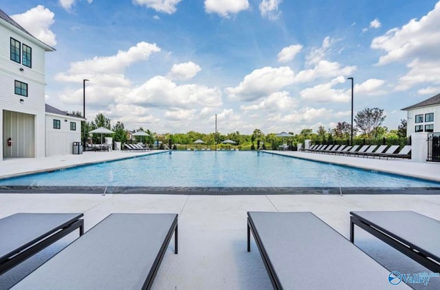 view of swimming pool featuring a patio