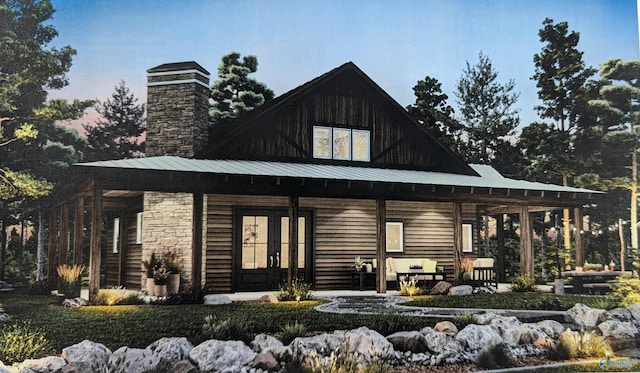 back house at dusk with french doors