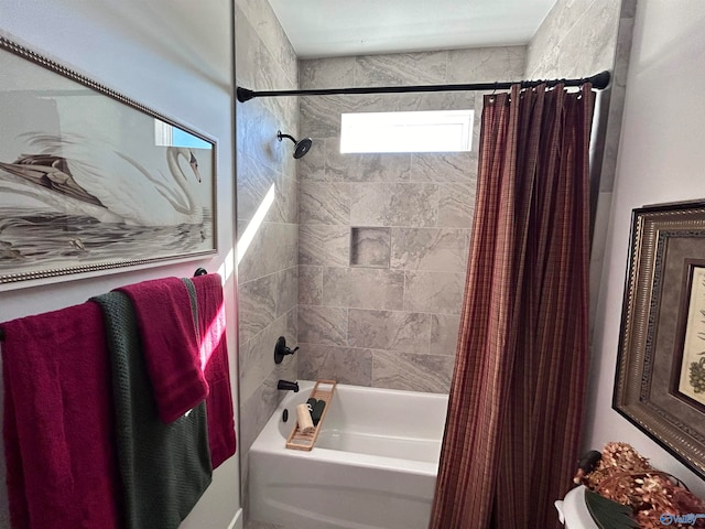 bathroom featuring shower / bathtub combination with curtain