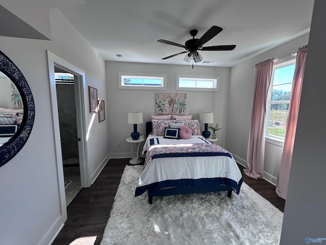 bedroom with ceiling fan and dark hardwood / wood-style floors