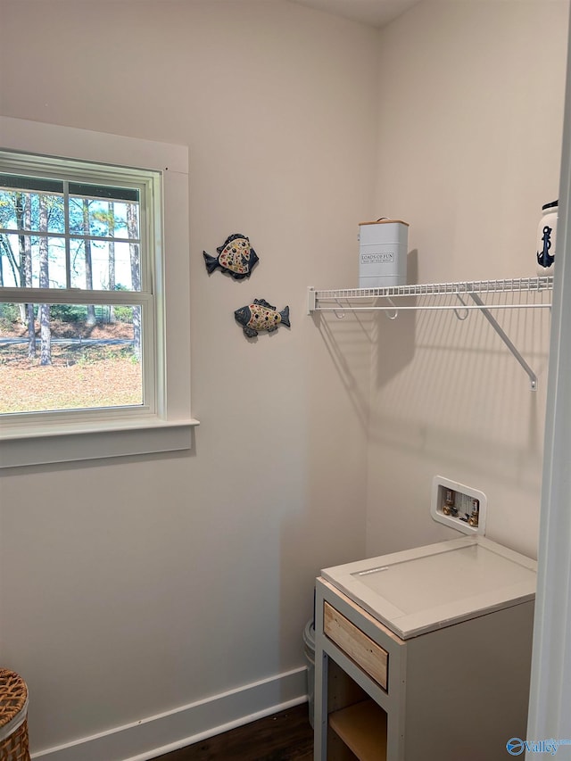 clothes washing area with washer hookup and dark hardwood / wood-style floors