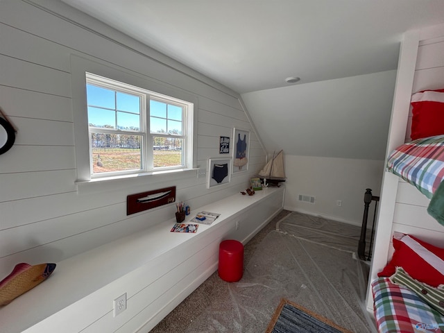 bathroom with vaulted ceiling