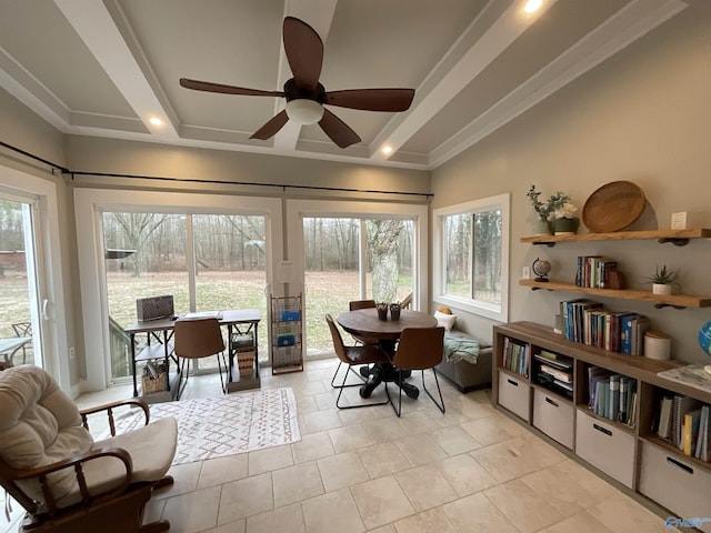 interior space featuring french doors, ceiling fan, and a tray ceiling