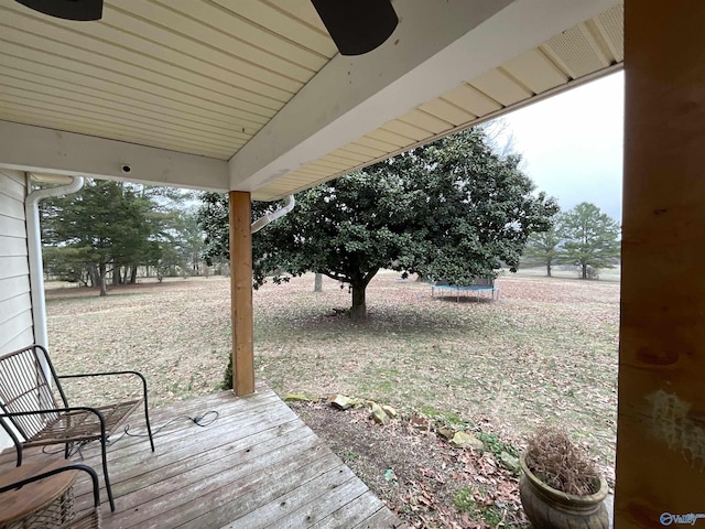 wooden deck with ceiling fan