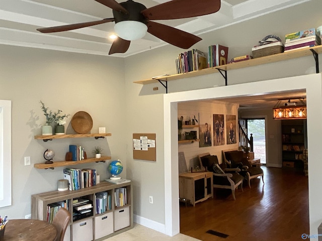 interior space with hardwood / wood-style floors and ceiling fan