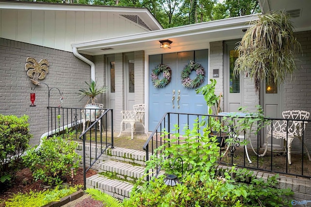 3103 Burningtree Mountain Rd, Decatur, AL 35603 - view of exterior entry featuring brick siding