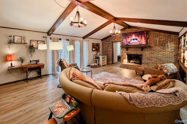 3103 Burningtree Mountain Rd, Decatur, AL 35603 - living room with a chandelier, brick wall, wood finished floors, a fireplace, and baseboards