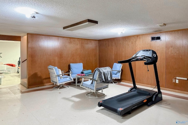 3103 Burningtree Mountain Rd, Decatur, AL 35603 - exercise area with a textured ceiling and wooden walls