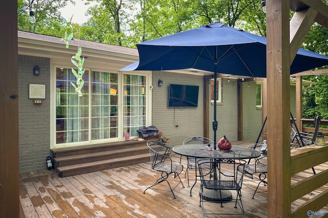 3103 Burningtree Mountain Rd, Decatur, AL 35603 - wooden terrace with outdoor dining area