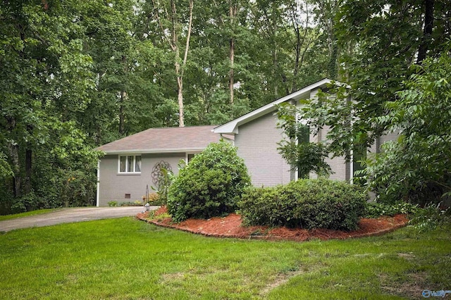 3103 Burningtree Mountain Rd, Decatur, AL 35603 - view of home's exterior with a lawn and brick siding
