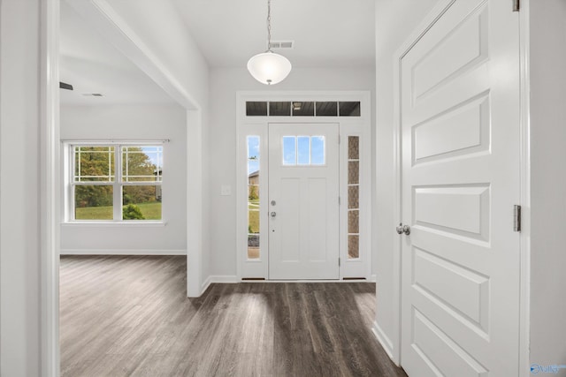 foyer featuring dark hardwood / wood-style floors