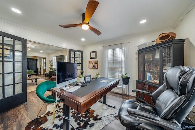 office space featuring ceiling fan, crown molding, wood-type flooring, and french doors