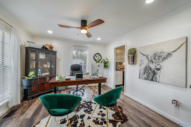 office space featuring ornamental molding, ceiling fan, and dark wood-type flooring