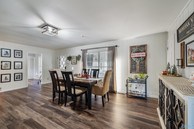 dining room with dark hardwood / wood-style floors