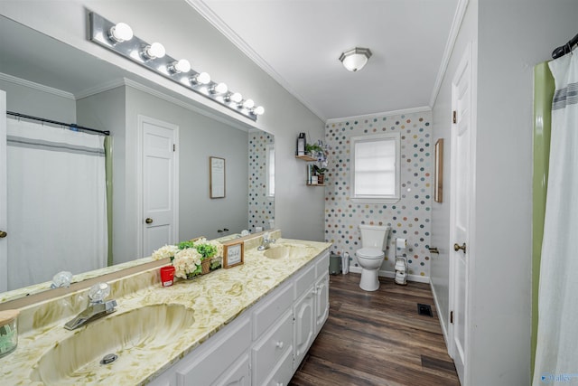 bathroom featuring vanity, crown molding, toilet, walk in shower, and wood-type flooring