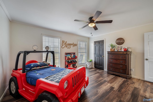 bedroom featuring ceiling fan, crown molding, and dark wood-type flooring