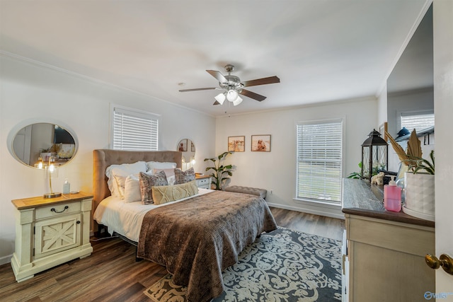 bedroom featuring dark hardwood / wood-style flooring, multiple windows, crown molding, and ceiling fan