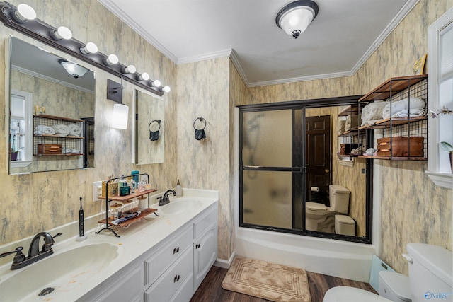 full bathroom featuring hardwood / wood-style floors, shower / bath combination with glass door, and crown molding