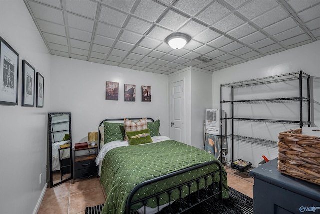 bedroom featuring tile patterned flooring