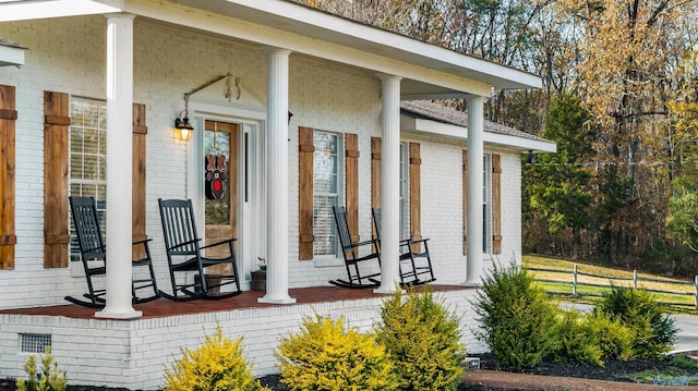 doorway to property with a porch