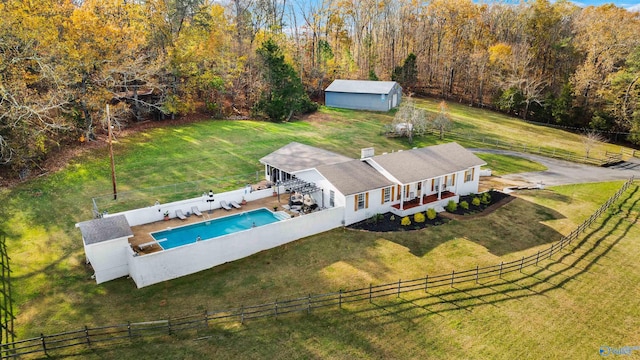 birds eye view of property with a rural view