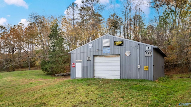 garage featuring a yard