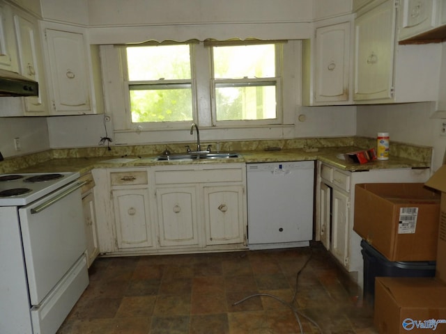 kitchen featuring white appliances, white cabinetry, a sink, and under cabinet range hood