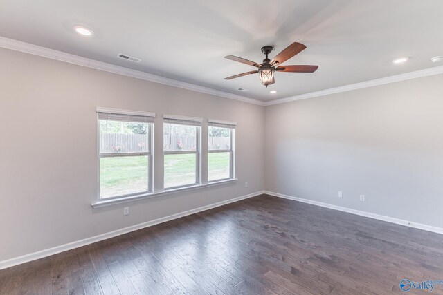 unfurnished room with dark wood-type flooring, baseboards, visible vents, and ceiling fan