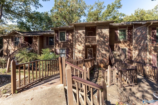 2113 Greenwood Pl Unit 2113, Huntsville, AL 35802 - rear view of house with stairway and brick siding