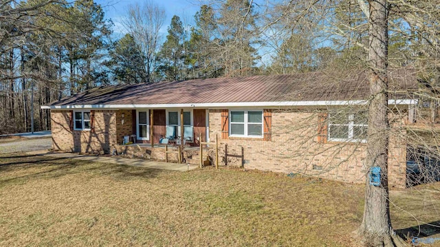 single story home with a front lawn and a porch