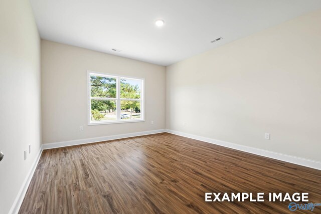 122 Burdine St, New Market, AL 35761 - unfurnished room featuring visible vents, baseboards, and wood finished floors