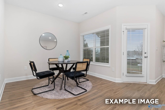 122 Burdine St, New Market, AL 35761 - dining space featuring baseboards, wood finished floors, and visible vents